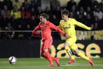 Jordi Alba y Luciano Vietto.