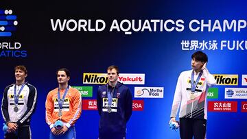 Nicolo Martinenghi, Arno Kamminga y Nic Fink and suman la plata junto al chino Qin Haiyang, ganador.