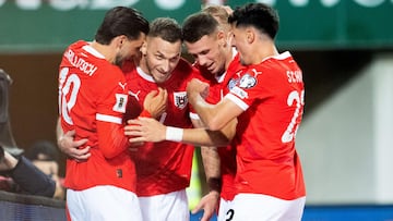 Austria's forward #07 Marko Arnautovic (2nd L) celebrates with team mates after scoring the 10:0 goal during the FIFA World Cup 2026 Group H European qualification football match Austria vs San Marino in Vienna, Austria, on October 9, 2025. (Photo by GEORG HOCHMUTH / APA / AFP) / Austria OUT