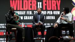 Deontay Wilder y Tyson Fury durante la rueda de prensa de presentaci&oacute;n de su combate de revancha.