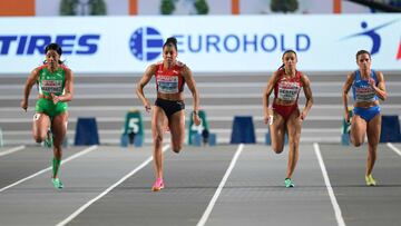 (L/R): Portugal's Arialis Martinez, Switzerland's Mujinga Kambundji, Spain's Jael Bestue and Italy's Anna Bongiorni compete in the semi-finals of the women's 60 metres during The European Indoor Athletics Championships at The Atakoy Athletics Arena in Istanbul on March 3, 2023. (Photo by YASIN AKGUL / AFP)