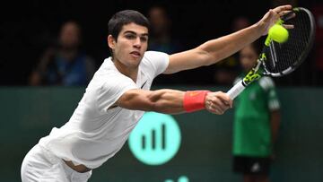 Spain's Carlos Alcaraz returns the ball to Canada's Felix Auger-Aliassime during the group stage men's singles match between Spain and Canada of the Davis Cup tennis tournament at the Fuente San Luis Sports Hall in Valencia, on September 16, 2022. - Spain's Davis Cup team will compete in the group stage against Serbia, Canada and South Korea from September 14 to 18. (Photo by Jose Jordan / AFP) (Photo by JOSE JORDAN/AFP via Getty Images)