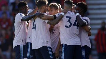 Arsenal's Martin Odegaard (centre) celebrates with his team mates after scoring the second goal of the game during the Premier League match at the Vitality Stadium, Bournemouth. Picture date: Saturday August 20, 2022. (Photo by Steven Paston/PA Images via Getty Images)