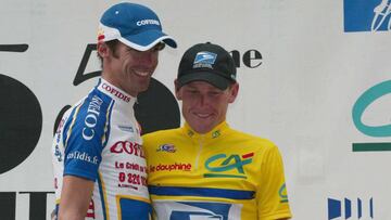 Lance Armstrong, junto a David Millar en el podio del Dauphiné 2003.