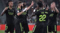 Real Madrid's French forward Karim Benzema (2L) celebrates with teammates scoring his team's second goal during the Spanish league football match between Elche CF and Real Madrid CF at the Martinez Valero stadium in Elche on October 19, 2022. (Photo by JOSE JORDAN / AFP) (Photo by JOSE JORDAN/AFP via Getty Images)