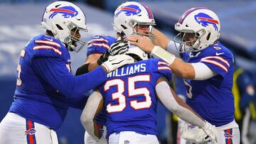 Jan 3, 2021; Orchard Park, New York, USA; Buffalo Bills running back Antonio Williams (35) celebrates his touchdown against the Miami Dolphins with teammates during the fourth quarter at Bills Stadium. Mandatory Credit: Rich Barnes-USA TODAY Sports