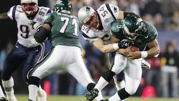 JACKSONVILLE, FL - FEBRUARY 6: Linebacker Tedy Bruschi #54 of the New England Patriots sacks quarterback Donovan McNabb #5 of the Philadelphia Eagles during Super Bowl XXXIX at Alltel Stadium on February 6, 2005 in Jacksonville, Florida. (Photo by Jed Jacobsohn/Getty Images)