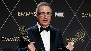 John Oliver poses with the Scripted Variety Series award and the Writing For A Variety Series award for "Last Week Tonight With John Oliver" at the 75th Primetime Emmy Awards in Los Angeles, California, U.S., January 15, 2024. REUTERS/Aude Guerrucci