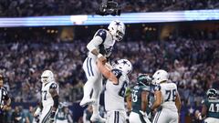 Dec 10, 2023; Arlington, Texas, USA; Dallas Cowboys quarterback Dak Prescott (4) celebrates a touchdown with Dallas Cowboys center Tyler Biadasz (63) in the second quarter at AT&T Stadium. Mandatory Credit: Tim Heitman-USA TODAY Sports