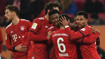 (L-R) Bayern Munich's midfielder Leon Goretzka, Bayern Munich's defender Mats Hummels, Bayern Munich's Austrian defender David Alaba, Bayern Munich's Spanish midfielder Thiago Alcantara, Bayern Munich's French defender Kingsley Co