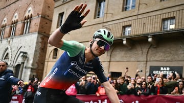 Decathlon CMA CGM Team's French Paul Seixas waves after crossing the finish line to win second place in the 20th one-day classic 'Strade Bianche' (White Roads) men's cycling race between Siena and Siena in Tuscany on March 7, 2026. (Photo by Marco BERTORELLO / AFP)