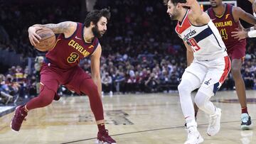 Nov 10, 2021; Cleveland, Ohio, USA; Washington Wizards guard Raul Neto (19) defends Cleveland Cavaliers guard Ricky Rubio (3) in the fourth quarter at Rocket Mortgage FieldHouse. Mandatory Credit: David Richard-USA TODAY Sports