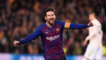 Barcelona's Argentinian forward Lionel Messi celebrates after scoring during the UEFA Champions League quarter-final second leg football match between Barcelona and Manchester United at the Camp Nou stadium in Barcelona on April 16, 2019. (Photo by J