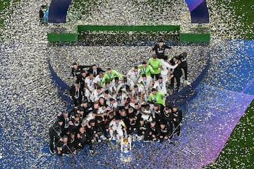 Real Madrid's players celebrate with the Champions League trophy at Wembley. 