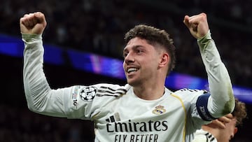 Real Madrid's Uruguayan midfielder #08 Federico Valverde celebrates scoring the opening goal during the UEFA Champions League last 16 first leg football match between Real Madrid CF and Manchester City at Santiago Bernabeu Stadium in Madrid on March 11, 2026. (Photo by Pierre-Philippe MARCOU / AFP)