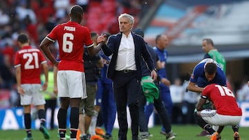 Pogba y Mourinho, tras un partido de la Premier.