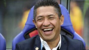 Sonriente, así lució antes del partido.
