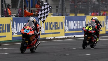 MotoGP - French Grand Prix - Bugatti Circuit, Le Mans, France - May 11, 2025 Red Bull KTM Ajo's Jose Antonio Rueda crosses the line to win the Moto3 race along with third placed Liqui Moly Dynavolt Intact GP's David Munoz REUTERS/Stephane Mahe