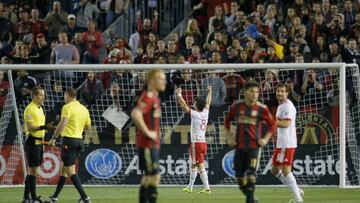 New York Red Bulls midfielder Felipe Martins (8) reacts as they win the game at the conclusion of the second half of an MLS soccer game against the Atlanta United FC on Sunday, March 5, 2017, in Atlanta. The New York Red Bulls won the game 2-1. (AP Photo/Todd Kirkland)