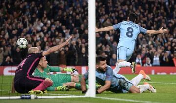 Gundogan wheels away after scoring, Ter Stegen and Mascherano about to protest.