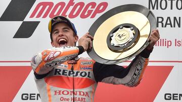 Repsol Honda MotoGP rider Marc Marquez of Spain holds up the trophy after winning the Australian motorcycle Grand Prix at Phillip Island on October 27, 2019. (Photo by PETER PARKS / AFP) / -- IMAGE RESTRICTED TO EDITORIAL USE - STRICTLY NO COMMERCIAL USE --
