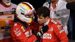 BAHRAIN, BAHRAIN - MARCH 31: Sebastian Vettel of Germany and Ferrari consoles third placed finisher Charles Leclerc of Monaco and Ferrari in parc ferme during the F1 Grand Prix of Bahrain at Bahrain International Circuit on March 31, 2019 in Bahrain, Bahrain. (Photo by Clive Mason/Getty Images)