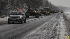 Service members of the 38th Brest Separate Guards Air Assault Brigade of the Belarusian armed forces drive vehicles during a snap inspection of troops' combat readiness at an unknown location in Belarus, in this handout picture released December 13, 2022. Dmitry Beletsky/Defence Ministry of Belarus/Handout via REUTERS ATTENTION EDITORS - THIS IMAGE WAS PROVIDED BY A THIRD PARTY. NO RESALES. NO ARCHIVES. MANDATORY CREDIT. WATERMARK FROM SOURCE.