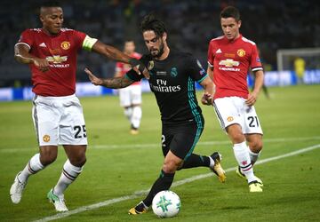 Isco con Antonio Valencia.