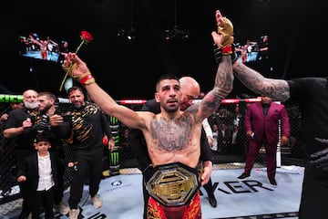 ABU DHABI, UNITED ARAB EMIRATES - OCTOBER 26: Ilia Topuria of Spain celebrates after a knockout victory against Max Holloway in the UFC featherweight championship fight during the UFC 308 event at Etihad Arena on October 26, 2024 in Abu Dhabi, United Arab Emirates.  (Photo by Chris Unger/Zuffa LLC)