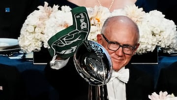New York Jets co-owner Woody Johnson gestures in front of one of the Super Bowl trophies of the New England Patriots during the 80th annual Alfred E. Smith Memorial Foundation Dinner at the Waldorf Astoria in New York City, U.S., October 16, 2025. REUTERS/Eduardo Munoz