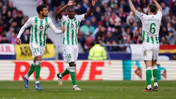 Soccer Football - LaLiga - Atletico Madrid v Real Betis - Metropolitano, Madrid, Spain - March 3, 2024 Real Betis' William Carvalho celebrates scoring their first goal with Chadi Riad and German Pezzella REUTERS/Juan Medina