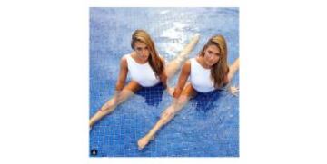 Bia y Branca Feres, de 26 años, se preparan con miras a los Juegos Olímpicos de Río, donde esperan destacar en nado sincronizado.