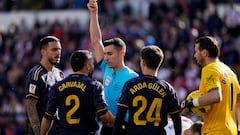 Soccer Football - LaLiga - Rayo Vallecano v Real Madrid - Campo de Futbol de Vallecas, Madrid, Spain - February 18, 2024 Real Madrid's Dani Carvajal is shown a yellow card by referee Alejandro Ruiz REUTERS/Ana Beltran