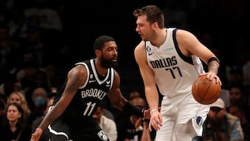 NEW YORK, NEW YORK - OCTOBER 27: (NEW YORK DAILIES OUT)  Luka Doncic #77 of the Dallas Mavericks in action against Kyrie Irving #11 of the Brooklyn Nets at Barclays Center on October 27, 2022 in New York City. The Mavericks defeated the Nets 129-125 in overtime. NOTE TO USER: User expressly acknowledges and agrees that, by downloading and or using this photograph, User is consenting to the terms and conditions of the Getty Images License Agreement. (Photo by Jim McIsaac/Getty Images)