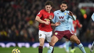 Manchester United's Welsh midfielder Daniel James (L) vies with Aston Villa's Brazilian midfielder Douglas Luiz (R) during the English Premier League football match between Manchester United and Aston Villa at Old Trafford in Manchester, north w