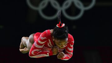 (FILES) US gymnast Simone Biles practics on the vault during a training session at the women's Artistic gymnastics at the Olympic Arena on August 4, 2016 ahead of the Rio 2016 Olympic Games in Rio de Janeiro. (Photo by EMMANUEL DUNAND / AFP)