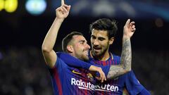 Barcelona&#039;s Spanish forward Paco Alcacer (L) celebrates with Barcelona&#039;s Portuguese midfielder Andre Gomes after scoring a goal during the UEFA Champions League football match FC Barcelona vs Sporting CP at the Camp Nou stadium in Barcelona on December 5, 2017. / AFP PHOTO / LLUIS GENE