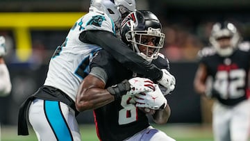 Oct 30, 2022; Atlanta, Georgia, USA; Atlanta Falcons tight end Kyle Pitts (8) runs against Carolina Panthers safety Xavier Woods (25) during the first half at Mercedes-Benz Stadium. Mandatory Credit: Dale Zanine-USA TODAY Sports