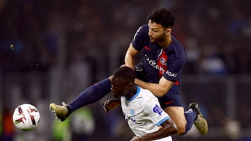 Olympique de Marseille v Paris St Germain - Orange Velodrome, Marseille, France - March 31, 2024 Paris St Germain's Goncalo Ramos in action with Olympique de Marseille's Pape Gueye REUTERS/Stephane Mahe