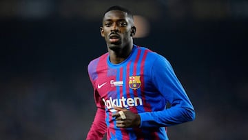 (FILES) In this file photo taken on December 18, 2021 Barcelona's French forward Ousmane Dembele runs on the pitch during the Spanish league football match between FC Barcelona and Elche CF at the Camp Nou stadium in Barcelona. - Barcelona's spo