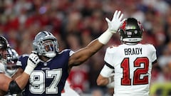 Dallas Cowboys defensive tackle Osa Odighizuwa (97) puts pressure on Tampa Bay Buccaneers quarterback Tom Brady (12)