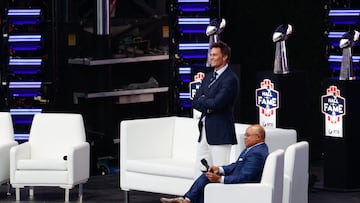 FOXBOROUGH, MASSACHUSETTS - JUNE 12: Tom Brady and Mike Tirico look on during the 2024 Hall of Fame Induction Ceremony for Tom Brady at Gillette Stadium on June 12, 2024 in Foxborough, Massachusetts. China Wong/Getty Images/AFP (Photo by China Wong / GETTY IMAGES NORTH AMERICA / Getty Images via AFP)