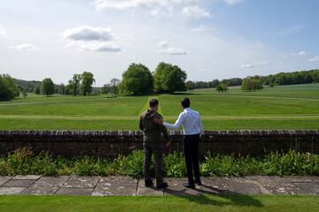 AYLESBURY, ENGLAND - MAY 15: Britain's Prime Minister, Rishi Sunak, and Ukraine's President, Volodymyr Zelenskiy, look out towards trees planted by Winston Churchill as they walk in the garden at Chequers on May 15, 2023 in Aylesbury, England. In recent days, Mr Zelenskiy has travelled to meet Western leaders seeking support for Ukraine in the war against Russia. Carl Court/Pool via REUTERS