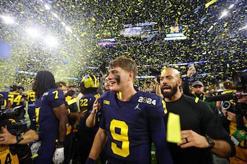 Michigan Wolverines quarterback J.J. McCarthy (9) celebrates after winning the 2024 College Football Playoff national championship.