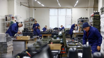Employees work at a production facility of Unwave company, a Ukrainian producer of jammers and radio electronic warfare, amid Russia's attack on Ukraine, at an undisclosed location, Ukraine October 28, 2024. REUTERS/Valentyn Ogirenko