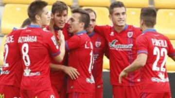 Los jugadores del Numancia celebran un gol.