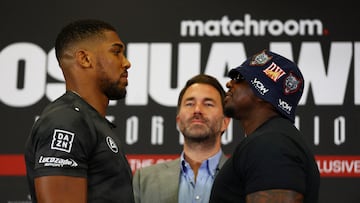 FILE PHOTO: Boxing - Anthony Joshua & Dillian Whyte Press Conference - Hilton London Syon Park, London, Britain - July 10, 2023 Anthony Joshua and Dillian Whyte go head to head as promoter Eddie Hearn looks on Action Images via Reuters/Matthew Childs/File Photo