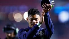 FC Porto's Brazilian forward #30 Evanilson Barbosa hat-trick scorer applauds supporters as he walks with teammates after victory in the UEFA Champions League Group H football match between Antwerp (BEL) and FC Porto (POR) at The Bosuilstadion in Antwerp on October 25, 2023. (Photo by KENZO TRIBOUILLARD / AFP)