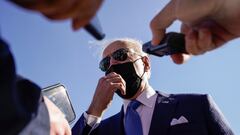 U.S. President Joe Biden talks to reporters as he arrives at New Castle Airport in New Castle, Delaware, U.S., March 26, 2021. REUTERS/Joshua Roberts