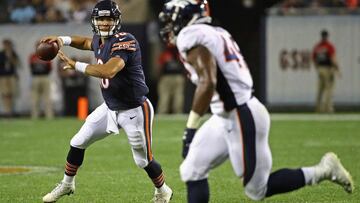 CHICAGO, IL - AUGUST 10: Mitchell Trubisky #10 of the Chicago Bears passes as Quentin Gause #49 of the Denver Broncos gives chase during a preseason game at Soldier Field on August 10, 2017 in Chicago, Illinois. The Broncos defeated the Bears 24-17.   Jonathan Daniel/Getty Images/AFP
 == FOR NEWSPAPERS, INTERNET, TELCOS &amp; TELEVISION USE ONLY ==